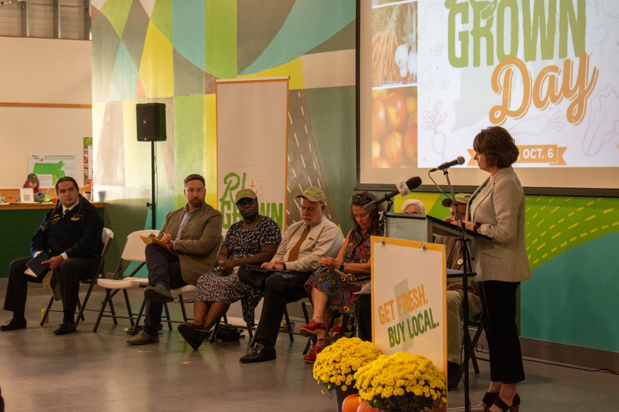 Rhode Island Community Food Bank CEO Melissa Cherney delivers a keynote address at the Farm Fresh RI building during Rhode Island DEM's RI Grown Week